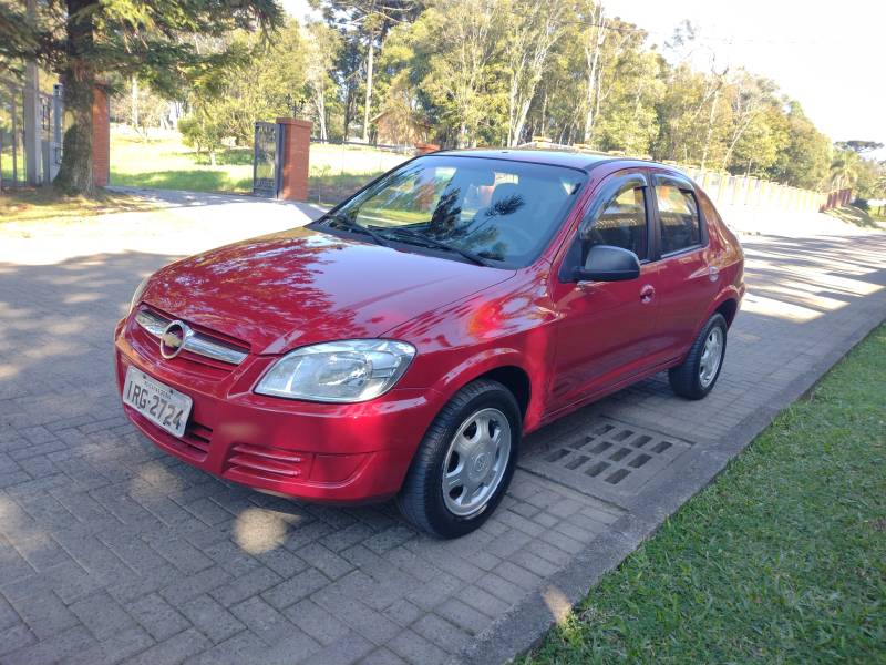 CHEVROLET - PRISMA - 2011/2011 - Vermelha - R$ 28.900,00